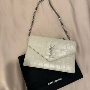 Saint Laurent Calfskin Crocodile Embossed Monogram Envelope Chain in Ivory.